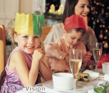 Children receive paper gift bags